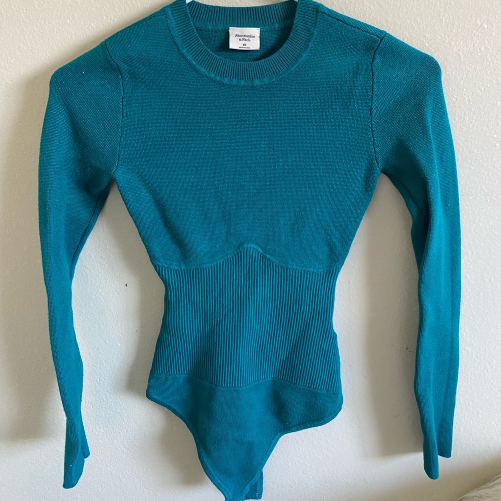 Green knit notched bodysuit.